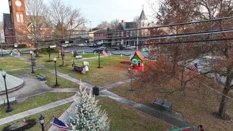 Season-greetings-sign-in-park-at-Christmas-time