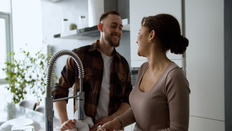 Lovely-couple-kissing-at-home