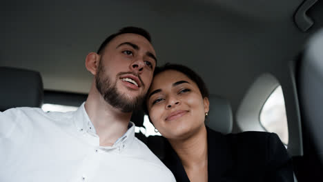 Young-couple-in-a-vehicle