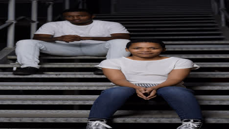 Couple-sitting-on-stairs