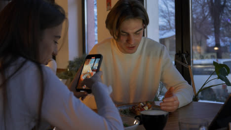 Girl-filming-her-boyfriend-for-social-media