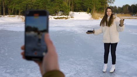 Man-filming-girlfriend-for-social-media