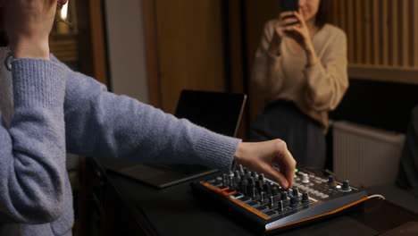 Woman-recording-with-smartphone