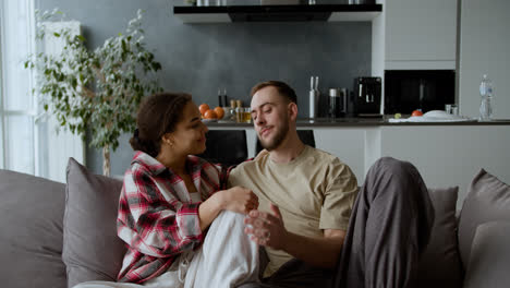 Couple-sitting-on-the-sofa