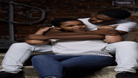 Couple-sitting-on-stairs