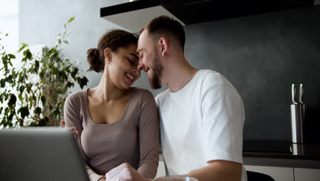 Lovely-couple-kissing-at-home