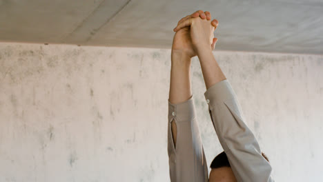 Man-stretching-indoors