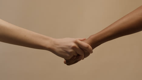 Two-people-holding-hands