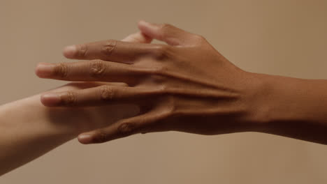 Two-people-touching-hands