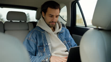 Man-travelling-in-a-car