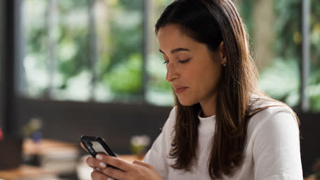 Woman-using-phone