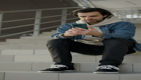 Man-sitting-on-the-stairs