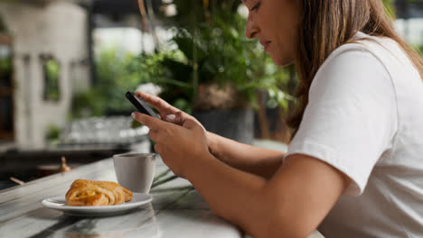 Woman-using-phone