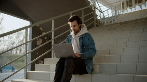 Man-sitting-on-the-stairs