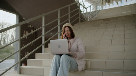 Woman-sitting-on-the-stairs