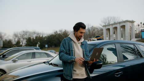 Man-sitting-outside-the-vehicle