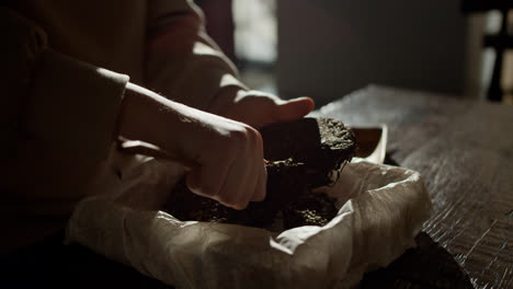 Person-picking-herbs-for-tea