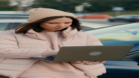 Woman-sitting-outside-the-vehicle