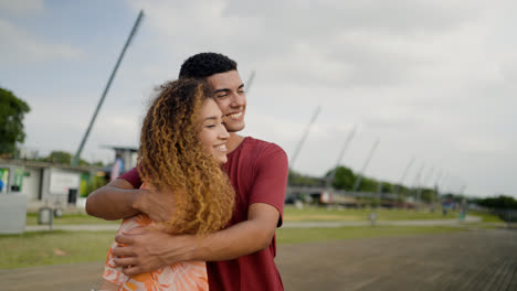 Couple-hugging-outside