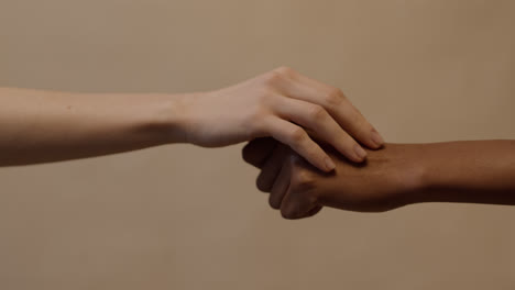 Two-people-touching-hands