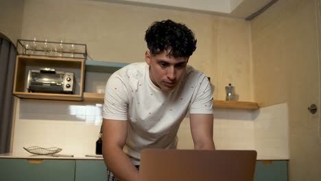 Latin-guy-drinking-coffee-at-home