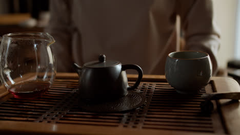 Person-making-tea-indoors