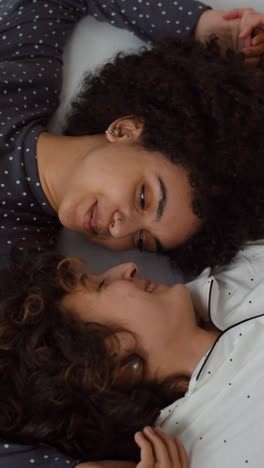 Lovely-couple-laying-on-bed