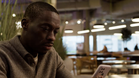 Man-sitting-at-the-restaurant