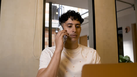 Latin-guy-working-at-home