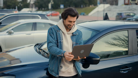 Man-sitting-outside-the-vehicle