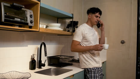 Latin-guy-drinking-coffee-at-home