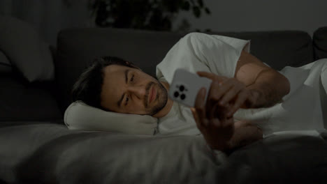 Man-using-smartphone-at-night