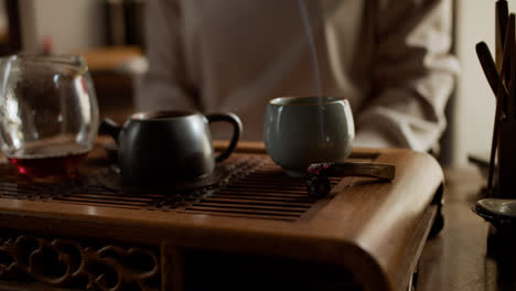 Person-making-tea-and-relaxing