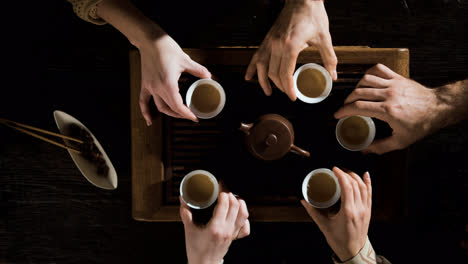 People-taking-cups-of-tea