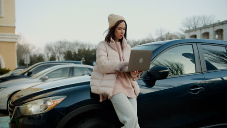 Woman-sitting-outside-the-vehicle