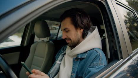 Man-using-his-smartphone