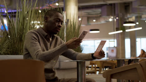 Man-sitting-at-the-restaurant