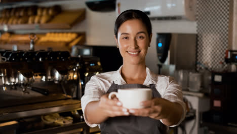 Barista-offering-coffee-cup