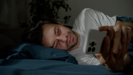 Man-using-smartphone-at-night