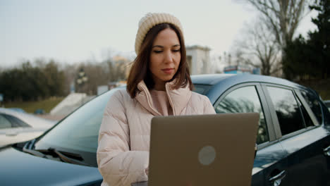 Woman-sitting-outside-the-vehicle