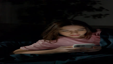 Woman-using-smartphone-at-night