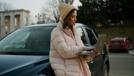 Woman-sitting-outside-the-vehicle