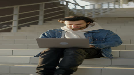 Man-sitting-on-the-stairs