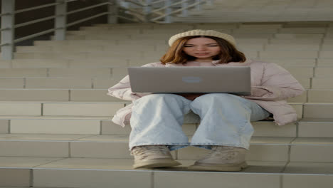 Woman-sitting-on-the-stairs