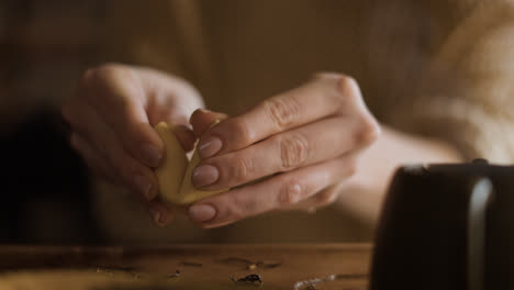 Woman-cracking-fortune-cookie