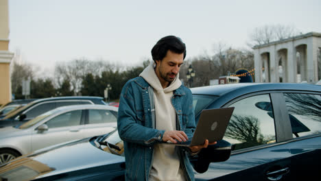 Man-sitting-outside-the-vehicle