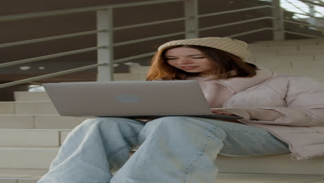 Woman-sitting-on-the-stairs