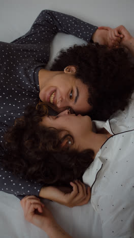 Lovely-couple-laying-on-bed