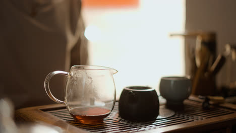 Person-making-tea-indoors