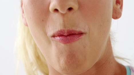 Close-up-of-woman-having-raspberries